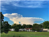 Big white clouds over a Skiatook property.